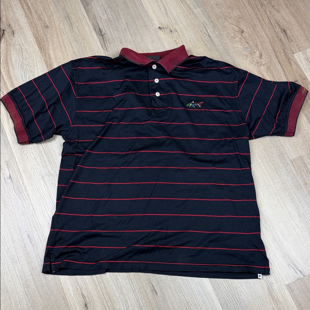 Greg Norman Men's Black Polo Shirt With Red Stripes. Size Large.